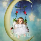 Кукла коллекционная "Маленькая София на качели"