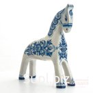 White horse with blue and light blue pattern