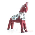 The horse is dark red with turquoise in the ornament.
