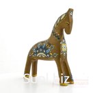 A dun horse with a floral pattern