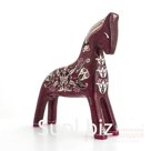 A dark red horse with Tatar motifs in the ornament